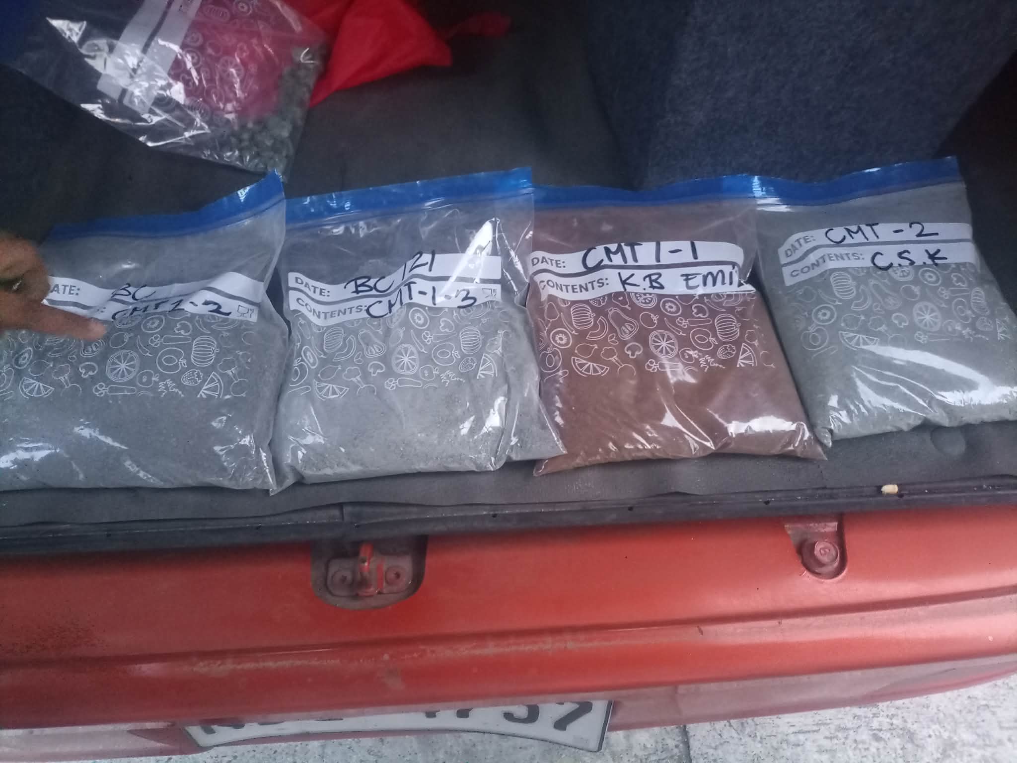 Multiple sealed mineral product samples arranged in a vehicle